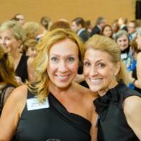 Guests posing together before the Enrichment Dinner.